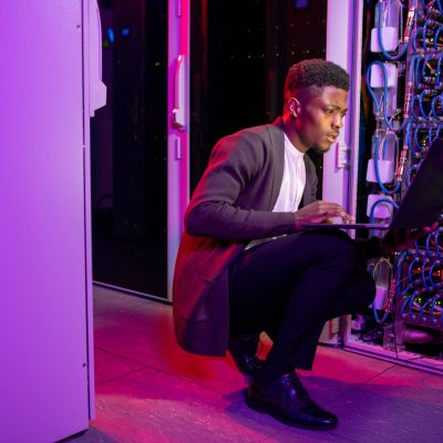 datacenter-engineer-checking-network-settings-laptop (2)